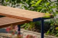 Holmen Public Backless Bench | L-shaped with wooden seat and metal legs