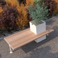 Holmen Bench w/ Planter Box in garden setting.