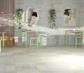 Holmen Outdoor Bar Table 4 Seats in a stylish modern setting.