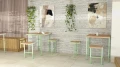 Holmen Outdoor Bar Table 4 Seats in modern patio setting.