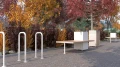 Holmen Bike Stand | U Shape in a modern park setting with autumn foliage.