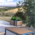 Christiania Outdoor Planter | 85 l on patio with view in the background