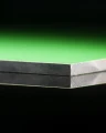 Green HPL plate with 10 mm thickness (sample 50×50 mm) angle view.