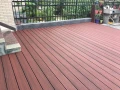 WPC Terrassendielen A10LL8, Stärke 2,5 cm, Länge 290 cm, auf einer Terrasse.