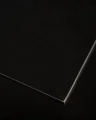 HPL PLATE BLACK thickness 10 mm (SAMPLE 50×50 MM) close-up.