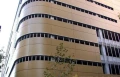 Exterior of a building clad with HPL PLATE WOOD thickness 10 mm (m²) dimensions 1220x2440 mm.