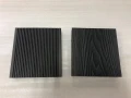 Two WPC TERRACE BOARDS / 3D10LL7 thickness 2.5 cm samples in black with different textures.