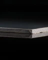 Close-up of the edge of HPL PLATE BLACK 10 MM (m²) 1300 MM OUTDOOR.