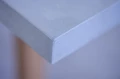 Close-up view of Concrete table edge.