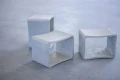 Concrete table in minimalist design on gray background.
