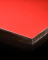 Red HPL plate 10mm thick measuring 1300x3050 mm.