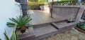 WPC TERRACE BOARDS / 3D10LL7 thickness 2.5 cm used on modern patio deck with plants.